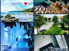 Bay Retreat Holiday Home Apartment The Bay Filey，位于法利的Spa酒店