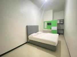 Arimbi Guest House Bungo Syariah RedPartner，位于Muarabungo的酒店
