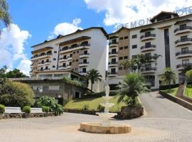 Flat encantador localizado no melhor de Serra Negra - SP，位于塞拉内格拉Vertentes Park附近的酒店