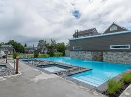 Condo climatisé près du Mont Sainte-Anne avec parc aquatique, piscine, spa, gym, arcades et billard !