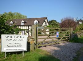 Whitewells Farm Cottages，位于大莫尔文的酒店