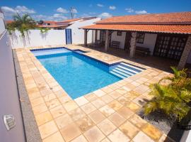 Casa Alta Jacuzzi - 02 Suítes #PARAÍSO DO BRASIL，位于托鲁斯的酒店