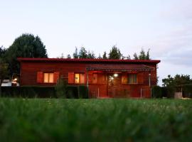 MI CASA DE MADERA，位于Paúl的酒店