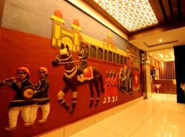 MC Suites Mysuru，位于迈索尔的酒店