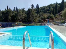 KAMINAKIA Apartments-Adults only -Walk into a tranquil oasis where peace & quiet are woven into every breath -Nestled within a serene evergreen cypress forest, each Apartment opens wide to the endless sea and a sunbathed pool awaits to soothe your senses，位于费斯卡尔德宏的酒店