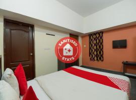 OYO Flagship 83212 Ora Inn Mysore，位于迈索尔的酒店