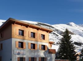 瓦坎西奥雪绒花公寓，位于莱德萨阿尔卑斯的公寓式酒店
