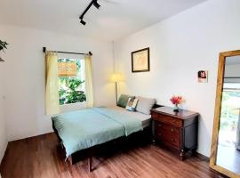 Vườn Nhà Ngoại Garden Homestay，位于Cu Chi的酒店