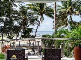 Rosy Sea Front Beach Condo