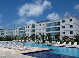 Palm Village Acqua - Apartamento Premium - Em frente à piscina - Porto de Galinhas，位于嘎林海斯港丘普海滩附近的酒店