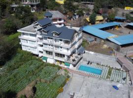 Hotel Oasis Kullu Manali，位于马拉里的酒店