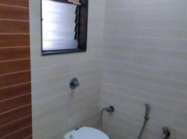 SPOT ON 82209 Chaitanya Beach Resort，位于Murūd的酒店