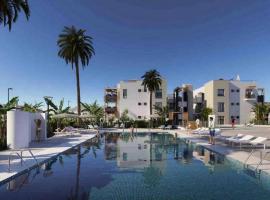 Green View Luxury appartment in new complex Pueblo Majorero next to golf course 5 min walk from the Beach and Atlantico Shopping Centre in Caleta de Fuste Next to Cassino and Elba Sara Hotel 2 bedrooms 2 bathrooms huge terace!，位于卡勒达德福斯特的酒店