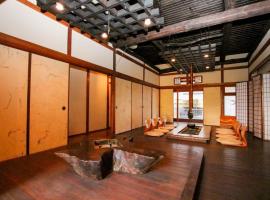 Guesthouse Omoya，位于松山Yasaka Temple附近的酒店