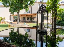 Can Dispès Hotel Rural，位于Viladamat的酒店