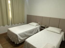 Hotel Esmig，位于新文达移民镇的酒店