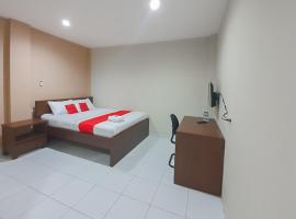 RedDoorz Plus at Pelita Guest House Balikpapan，位于巴厘巴板苏丹阿吉·穆罕默德·苏莱曼国际机场 - BPN附近的酒店