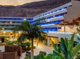 大加那利莫干山雷迪森蓝光温泉度假酒店，位于莫甘海滩的家庭/亲子酒店