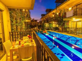 Yaşam Park Apart Hotel - Fethiye Calis Beach，位于费特希耶的酒店