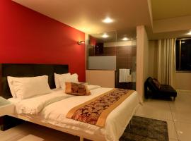 Tills at Vienna Hotel，位于特马的酒店