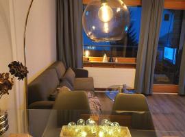LAAX Central Holiday Apartment with Pool & Sauna，位于莱克斯的海滩酒店