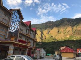 Hotel Raxit Inn，位于Bajaura的酒店