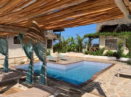 Zanzibar Tropical Sunset Boutique Hotel - Adults Only，位于吉汶瓦的酒店