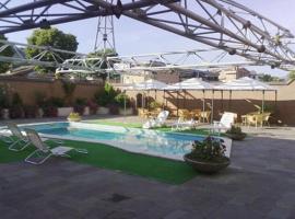 77酒店，位于托伦蒂诺的酒店