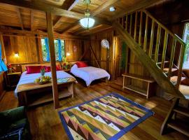 Casa Divina Eco Lodge，位于明多的木屋