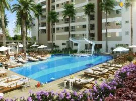 Apartamento novo frente mar com piscina em Home Club