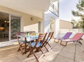 Appartement Calme Proche Plage avec Terrasse Sud, Parking Sécurisé et Équipements Complets - FR-1-306-909