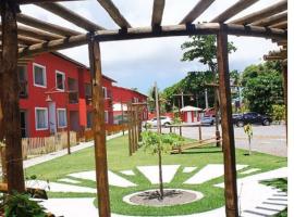 Village Ecoville das Mangueiras fica a 3km da praia de Guarajuba，位于卡马萨里的公寓
