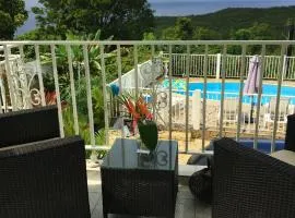 Appartement d'une chambre avec vue sur la mer piscine partagee et jardin clos a Deshaies a 5 km de la plage