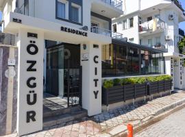 Ozgur City Residence，位于费特希耶Fethiye stadium附近的酒店