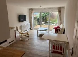 Adorable One-Bedroom Flat With Patio Garden.