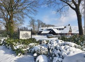 屯特罗斯，位于德吕特的酒店