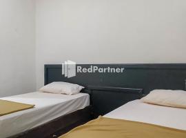 Palu City Guest House Mitra RedDoorz，位于帕卢的酒店