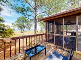 Coronado Cove Cottage，位于多芬岛的酒店