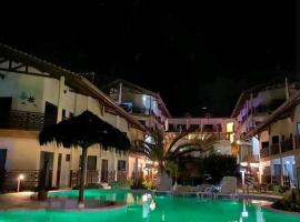 Apartamento a 60 metros para pé na areia - The Fountains - apto 105，位于贝贝里比的酒店