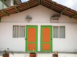 Room with 1 double bed and 2 single beds