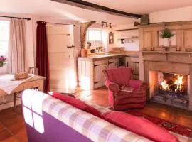 Farm Cottage a cute C17th cottage a walk across the fields to a great pub