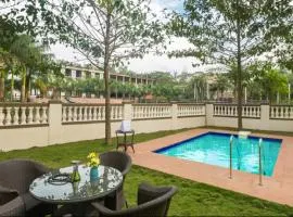 StayVista's Greenwoods Villa 7 - City-Center Villa with Private Pool, Terrace, Lift & Ping-Pong Table