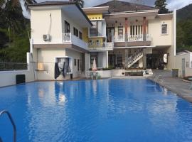 Wisma maninjau lake inn，位于Kotabaru的酒店