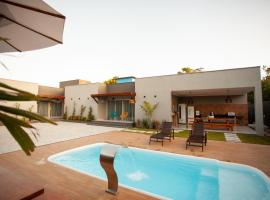 Flats com WI-FI 350mbps a 5min da Praia do Parracho，位于阿拉亚尔达茹达的酒店