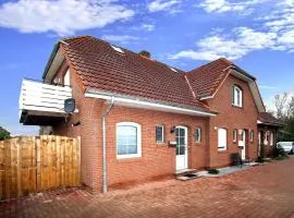 Ferienhaus mit Garten und Terrasse in Dornum