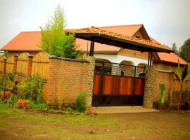 URUGANO VIRUNGA PALACE，位于Nyarugina的家庭/亲子酒店