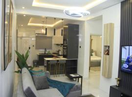 Cosy 2-Bedroom Apartment With Superfast Wifi and 24x7 Security and Electricity，位于莱基的酒店