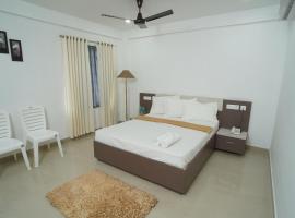 SN ROOMS，位于Perumbavoor的酒店
