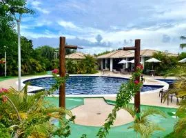 Vila dos Lírios Reserva Imbassaí apto aconchegante