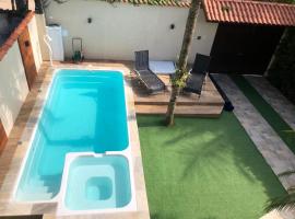 Casa de praia, piscina aquecida, cervejeira e bilhar，位于伯迪亚哥Restingas of Bertioga Estadual Park附近的酒店